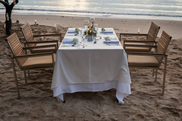 istock dinner table on the beach at Thailand 992735282