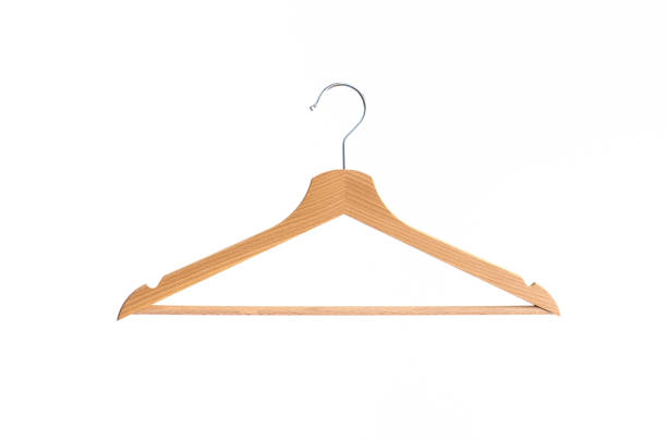 Hanger isolated Wooden coat hanger isolated against bright white background coathanger stock pictures, royalty-free photos & images
