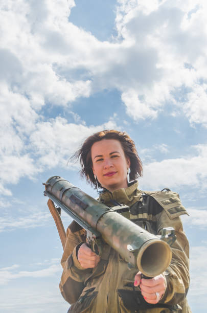 istock girl in uniform with a Bazooka 992754700