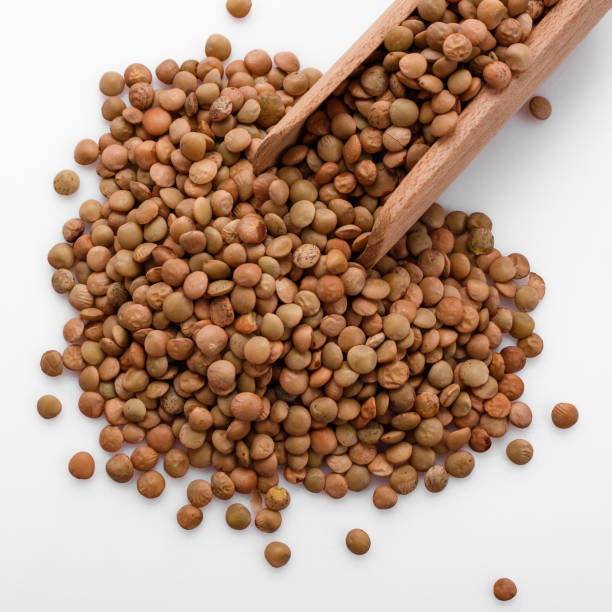 istock raw lentils on a white acrylic background 992754780