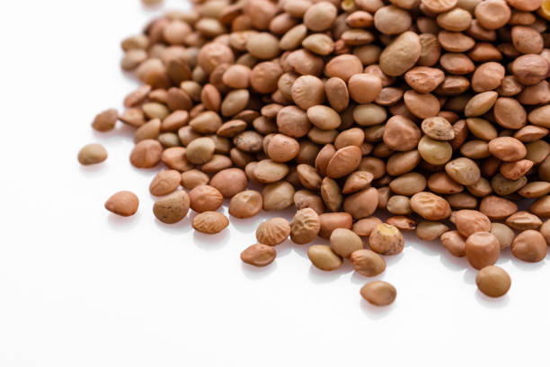 istock raw lentils on a white acrylic background 992754818