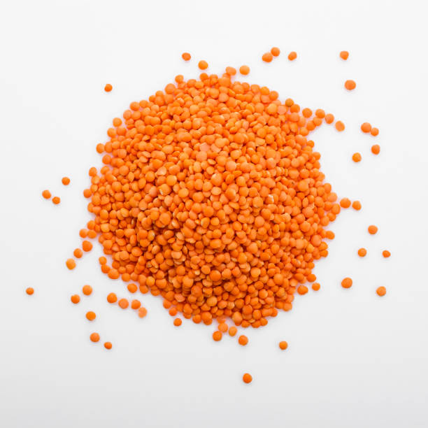 istock raw lentils on a white acrylic background 992755214