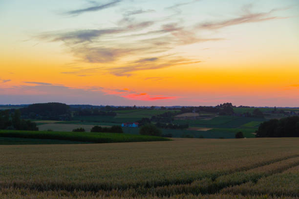 istock sundown dusk sunset vibrant sky rolling hills countryside rural scenic view 992765896