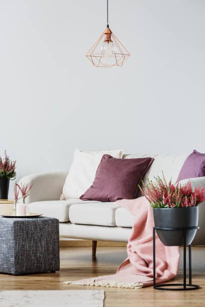 living room with copper lamp - flower pot vase purple decor imagens e fotografias de stock