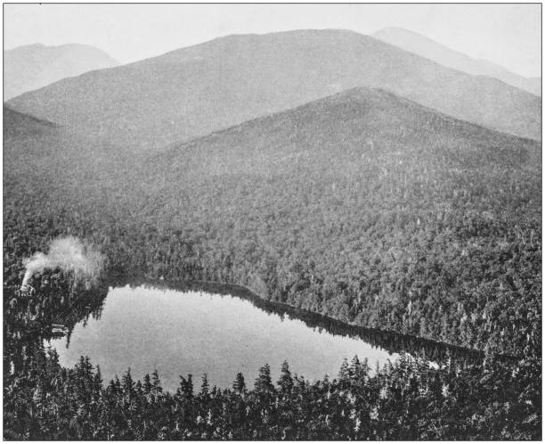 Antique photograph of America's famous landscapes: Adirondack lodge, Clear Lake Antique photograph of America's famous landscapes: Adirondack lodge, Clear Lake adirondack mountains stock illustrations