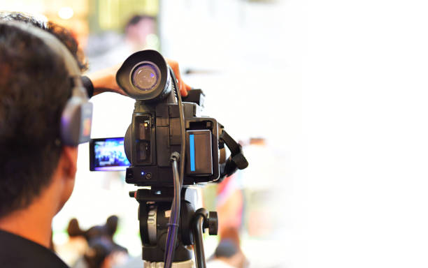 istock Photographer video recording activity 992781688