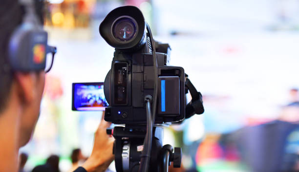 istock Photographer video recording activity 992781964