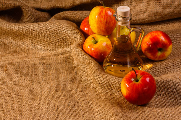 istock apple vinegar on a wooden rustic background 992782330