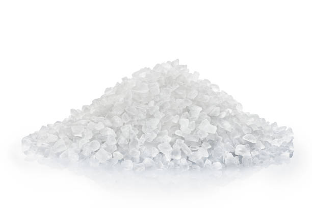 istock heap of salt isolated on white background. 992786172