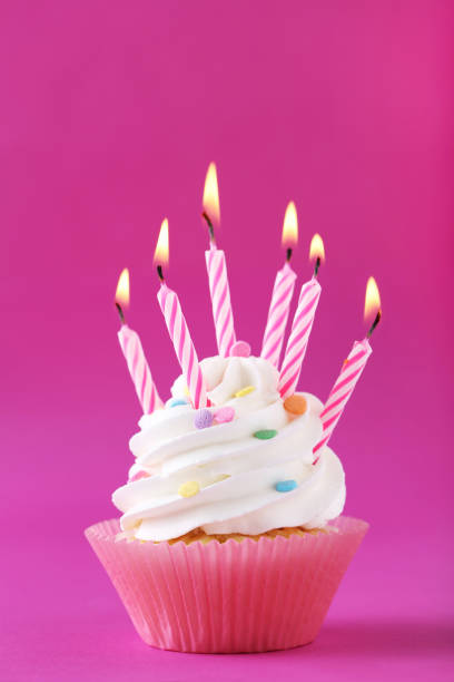 istock Tasty cupcake on a pink background 992788202