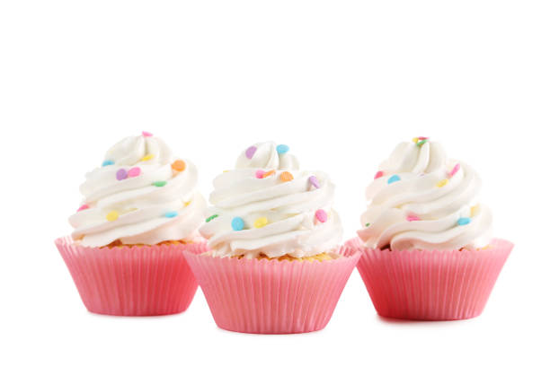 istock Tasty cupcakes isolated on a white 992790726