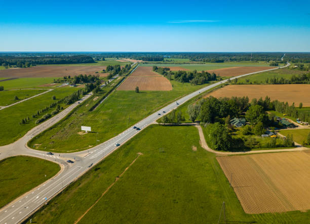 istock Road from above and white billboard. Aerial view. Drone. 992795110