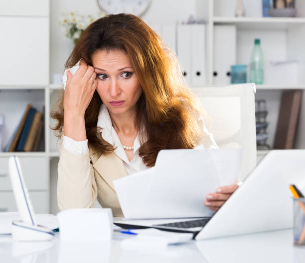 istock Woman is upset because of complicated issue with project 992803738