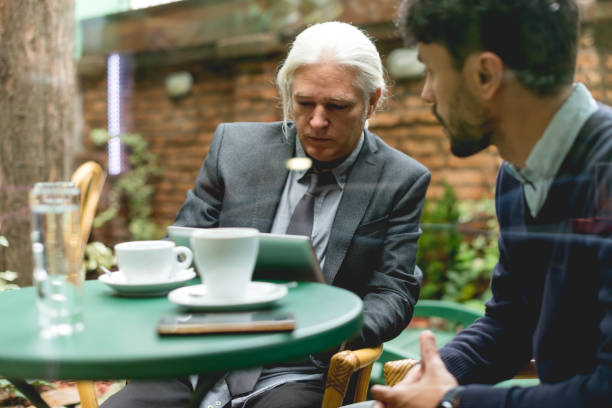 istock Two colleagues have a meeting in the cafe 992806788