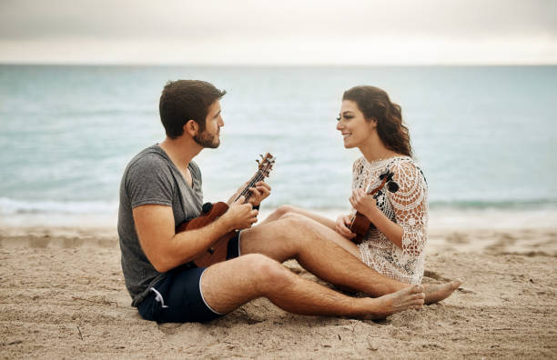 istock Singing love songs on the beach 992816924