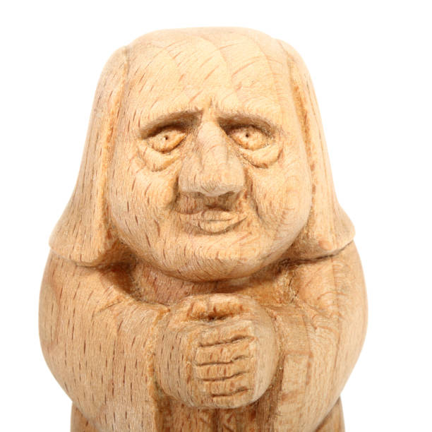 istock Figurine of a Monk carved from beech. Front view 992823604