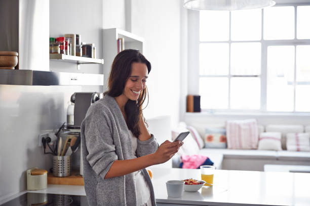 istock Logging into her favourite social media accounts 992824350