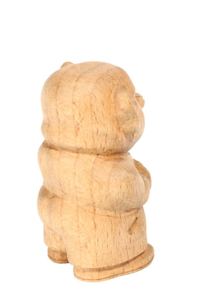 istock Figurine of a Troll carved from beech. Fairytale character. Back view 992824704