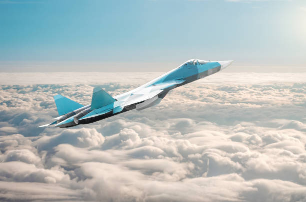 Fighter jet on a combat mission above the clouds. Fighter jet on a combat mission above the clouds supersonic airplane stock pictures, royalty-free photos & images