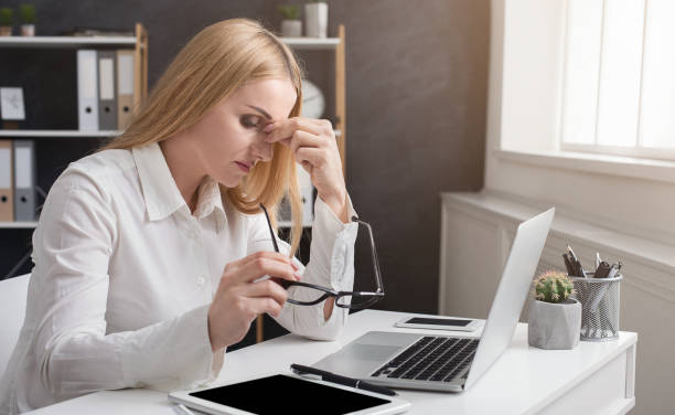 istock Tired lawyer sitting at the office 992833528