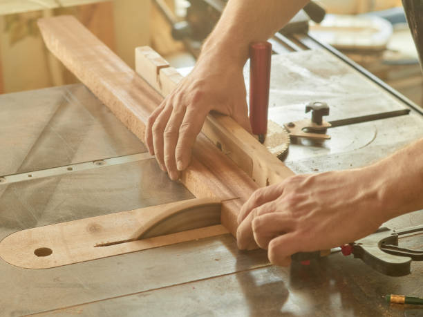 istock Lautner makes a classic guitar. Cutting of blanks for linings. 992841250