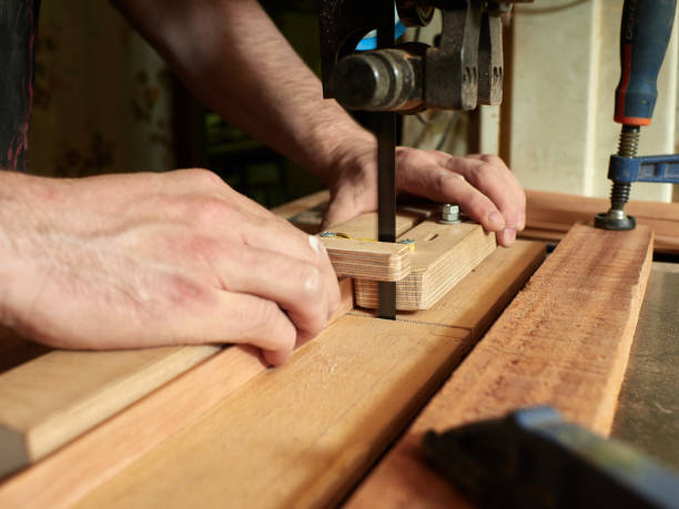 istock Lautner makes a classic guitar. Making slots in the lining. 992841328