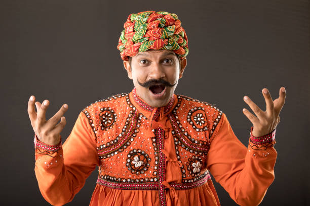 Portrait of surprised Indian man in traditional clothing