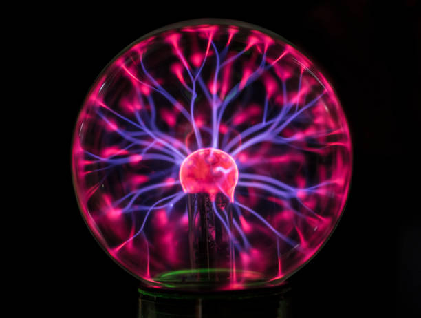 istock Closeup of a plasma globe in the darkness 992859878
