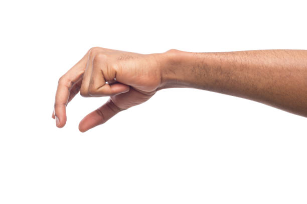 istock Male hand picking up something, cutout 992860498