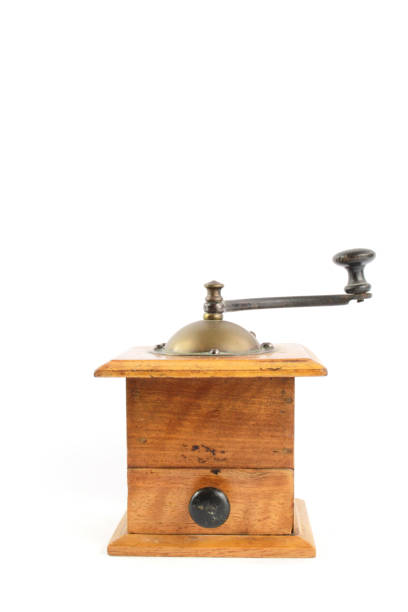 istock Small Wooden Manual Coffee Grinder on White background 992862970