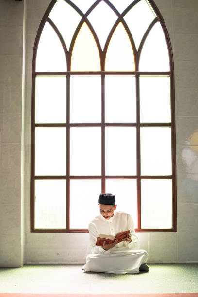 istock Muslim man studying The Quran 992864288