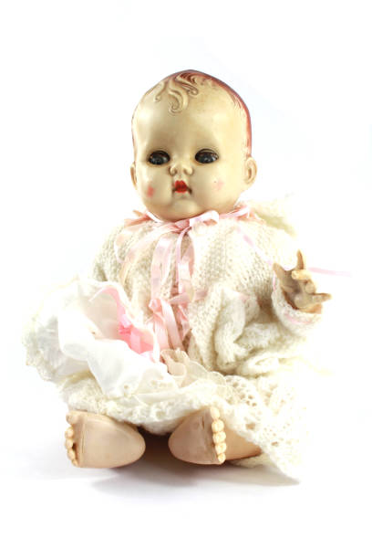 istock Vintage Antique Doll on White Background 992866272