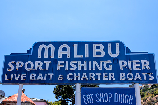 Sign at the entrance of famous Malibu Sport Fishing Pier in Malibu, Southern California.