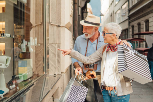 istock Happy mature couple  window shopping 992867190