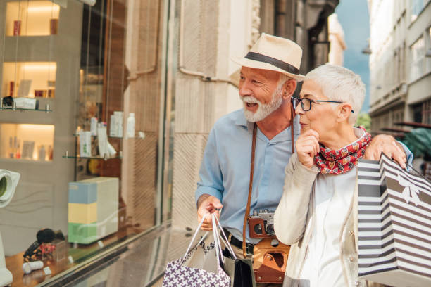 istock Happy couple looking at the shop window 992867218