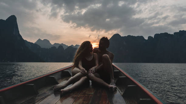 istock Couple boating on a quiet lake 992867648