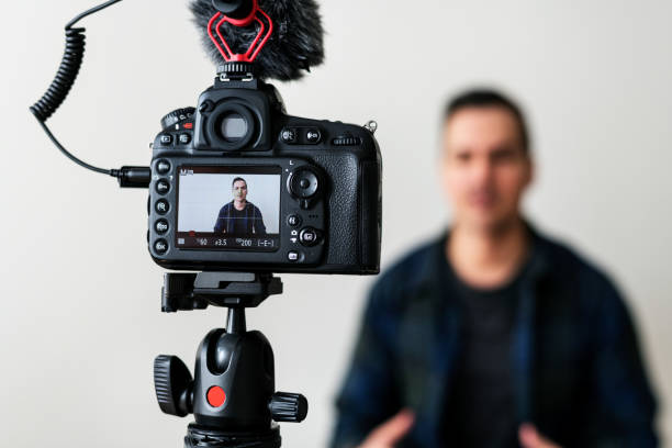 istock White blogger recording video 992880598