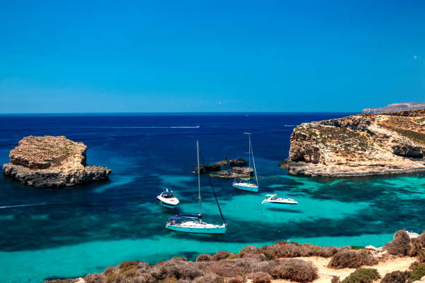 istock Blue water blue sky boats 992885166