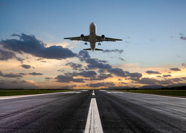 istock Passenger airplane taking off at sunset 992888942