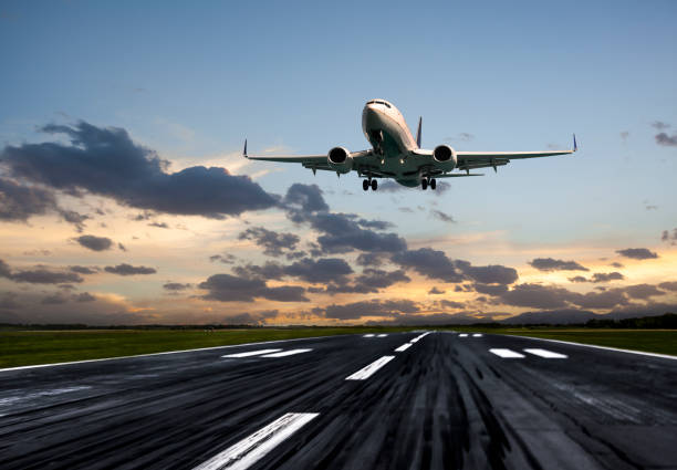 istock Passenger airplane taking off at sunrise 992889264