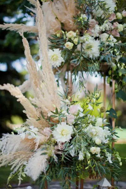 flower composition with roses, dryflowers in bohemian style