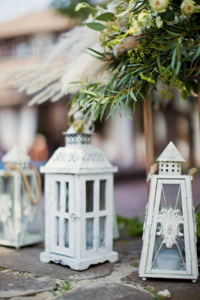 istock white vintage lanterns with candles 992893080