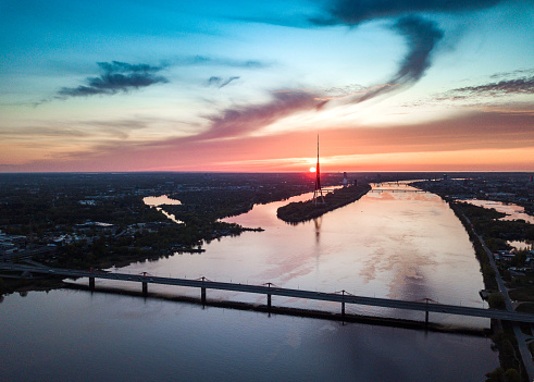 Sunset in Riga, Latvija. View from above to South bridge and TV tower.