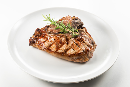 Dish with Grilled t-bone chop of pork