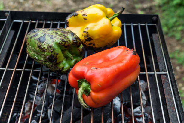 Group of  bell peppers isolated on white background. Green, yellow, red colors.