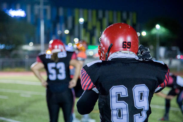 Women coaching American football