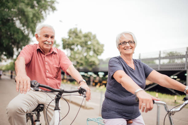 istock Husband and wife on bicycles 992913464