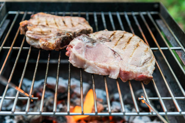 istock T-bone chop of pork on the grill 992913526