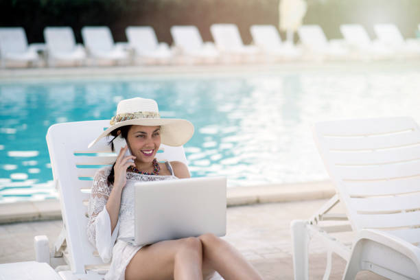 istock Young Woman at the pool 992923900