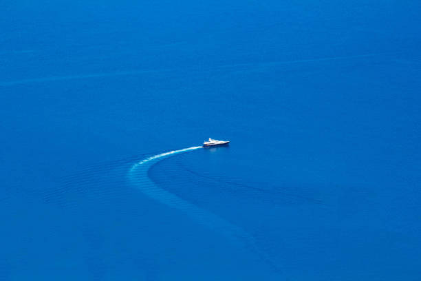 jetski dancing in blue waters. - wake jet boat water water sport imagens e fotografias de stock